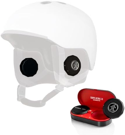 A person wearing a helmet with Chips Ultra 2.0, enjoying music while skiing down a mountain.